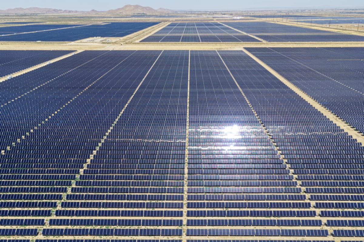 Solar panels and large battery storage systems in California desert storing renewable energy