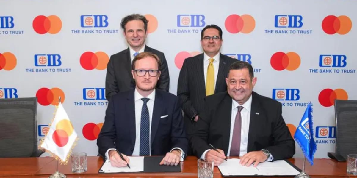 Mastercard and Commercial International Bank logos displayed together at partnership renewal ceremony