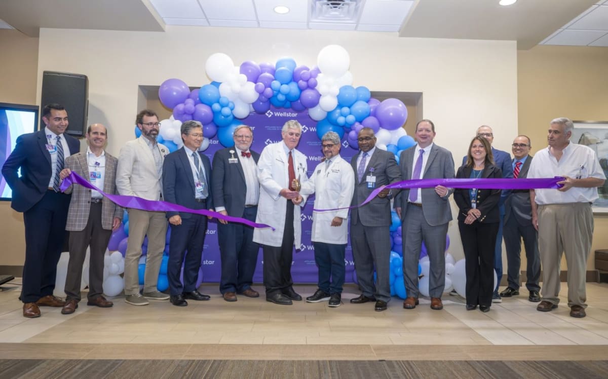 Medical staff and administrators at ribbon cutting ceremony for new Gamma Knife radiation system