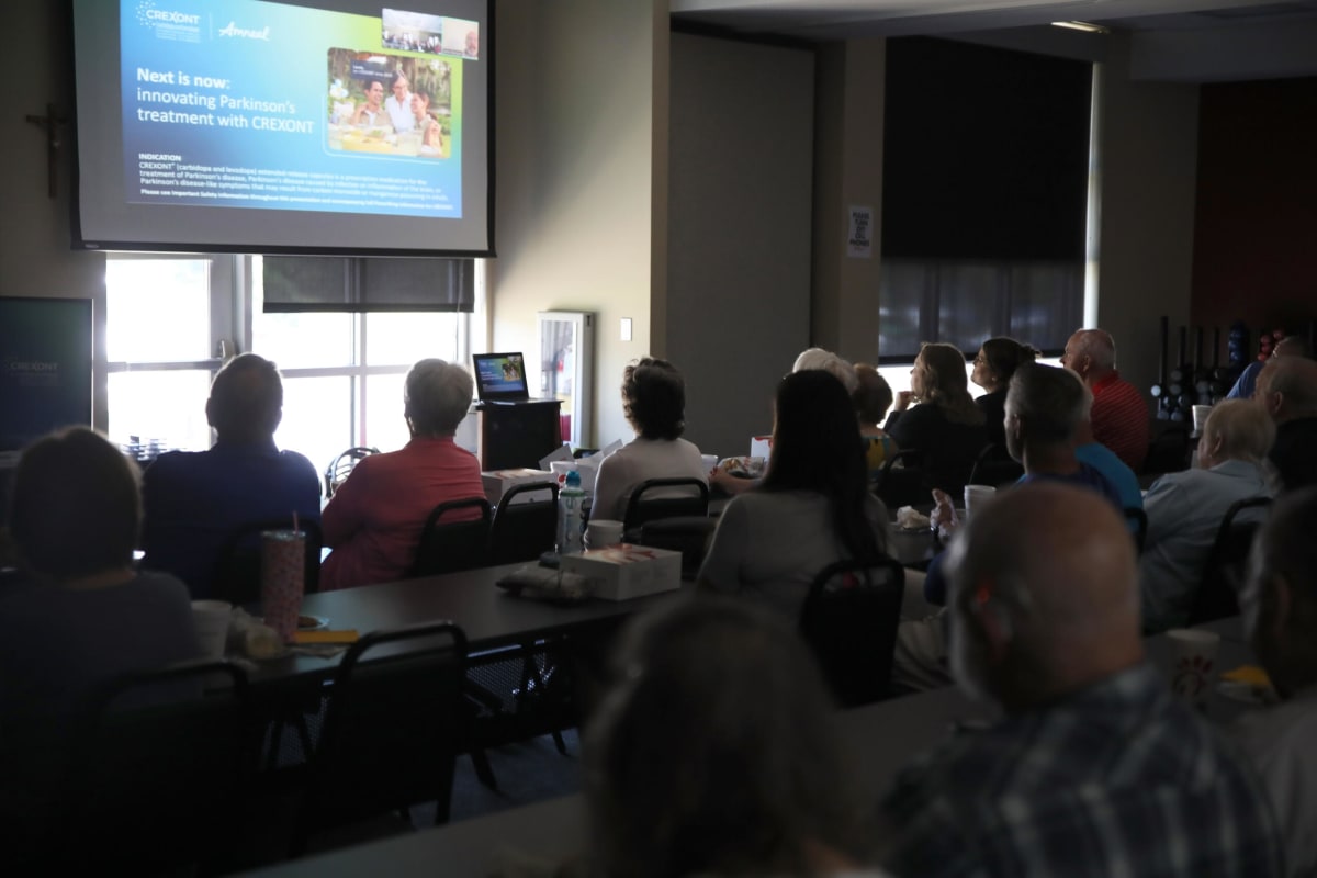 Community members attending virtual presentation about Parkinson's disease treatment options in Jonesboro