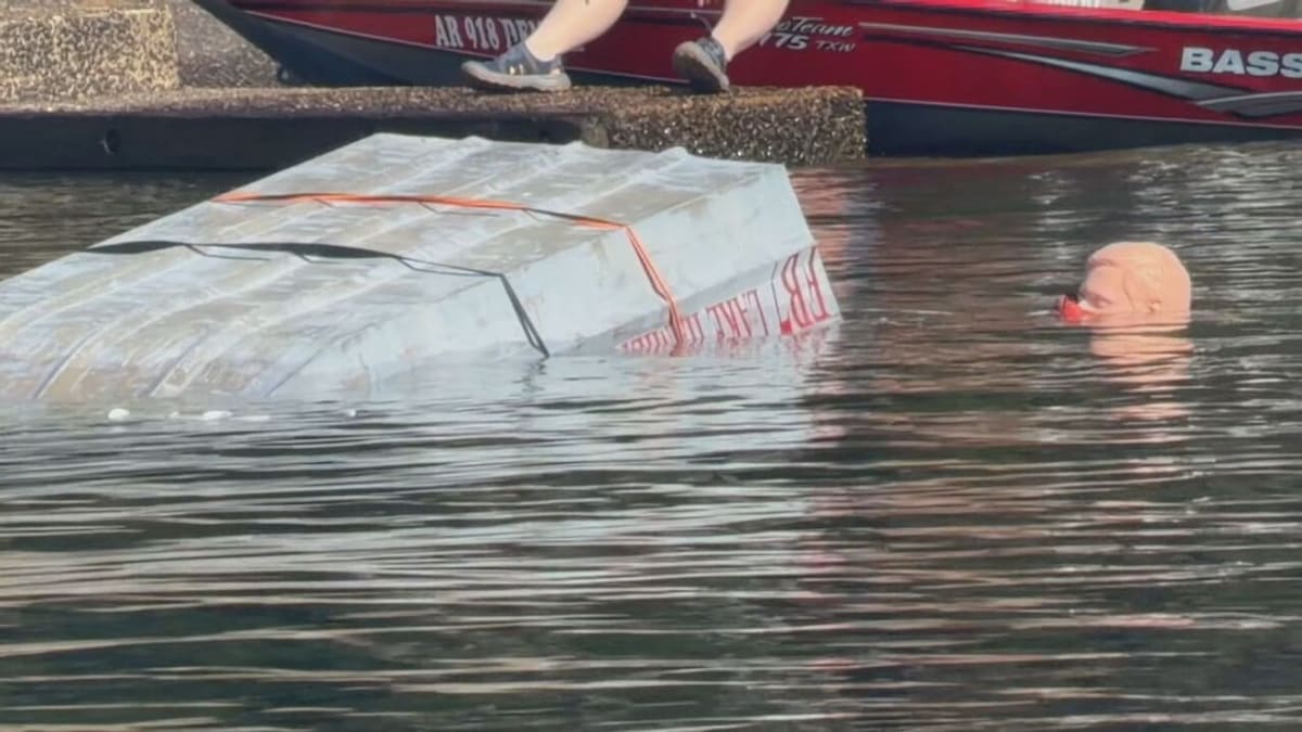 ** Firefighters training in rescue boat operations on DeGray Lake in Arkansas