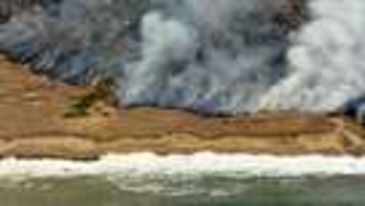 Coast Guard Rescues Boater Stranded on Burning Island - Image 3