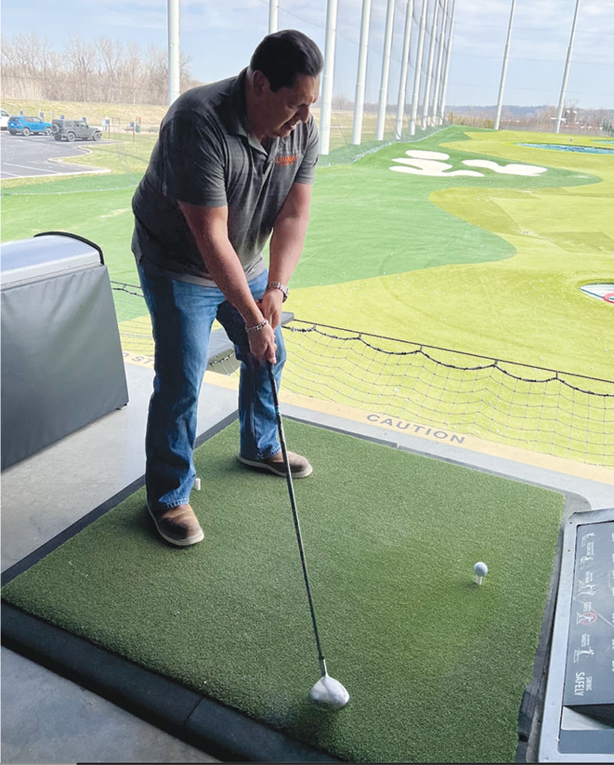Union members at Top Golf driving range participating in Missouri Works Initiative fundraiser event