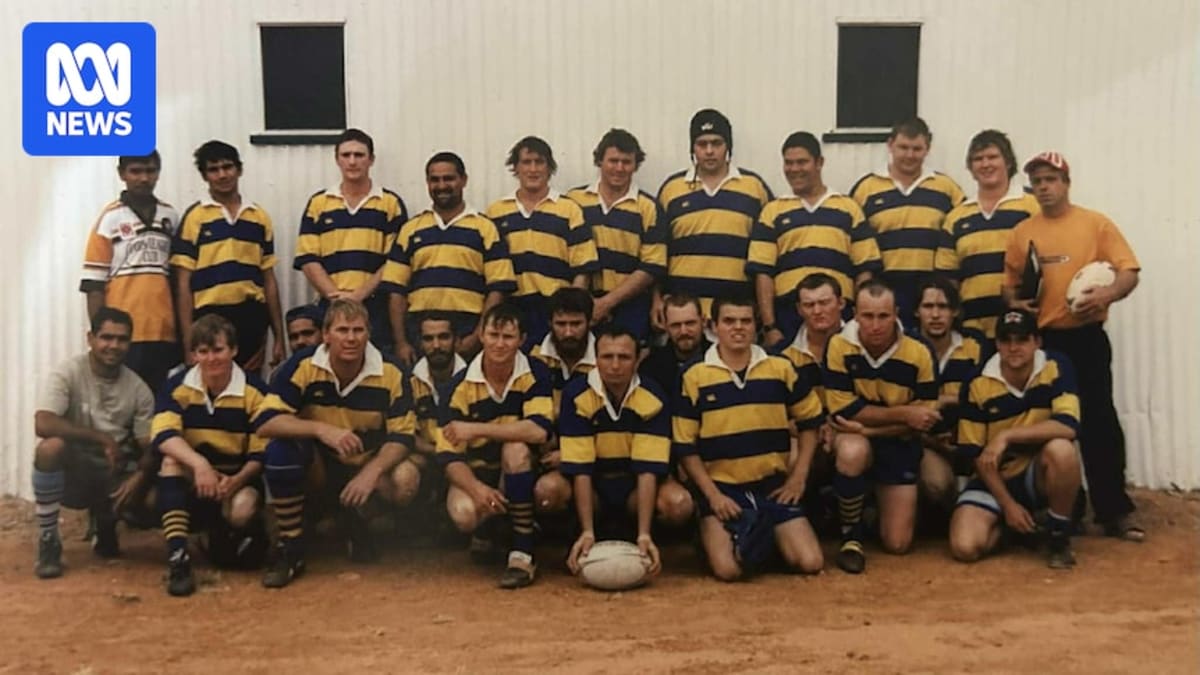 Thargomindah Bulls rugby league team posing together on outback Queensland field after 24 year hiatus