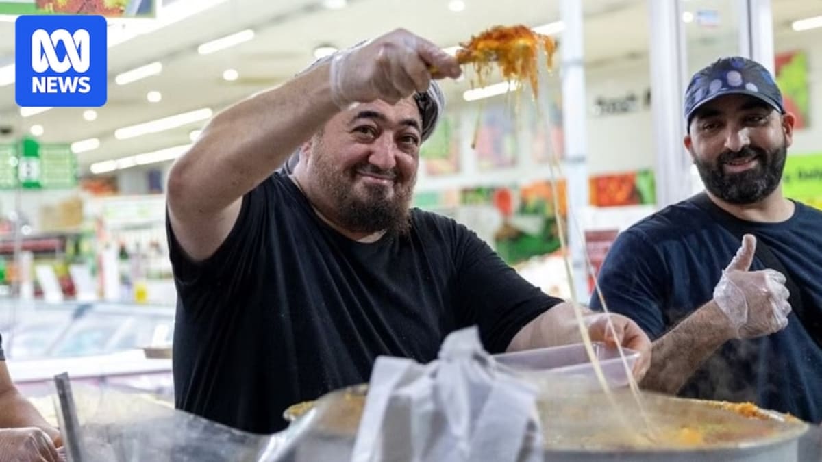 Crowded street festival at night with food stalls and visitors at Lakemba Nights in Sydney