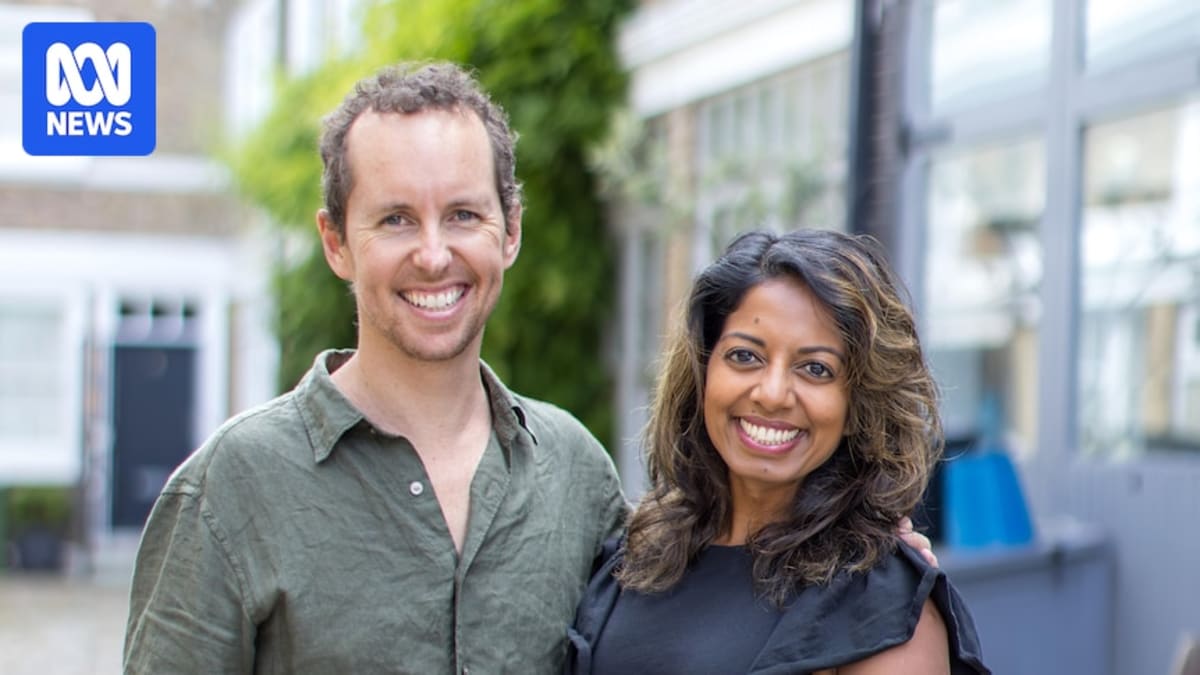 Comedian Sashi Perera and husband Charlie smiling together on trip to Perth, Australia