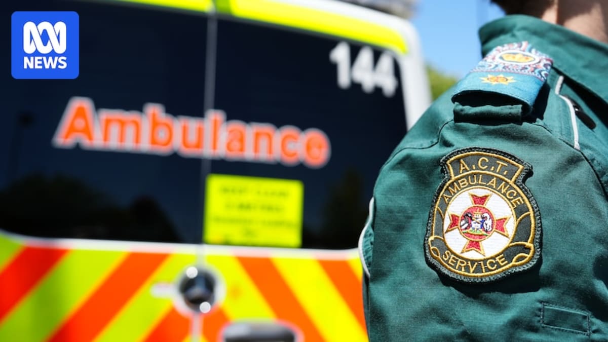 Ambulance and fire truck parked at emergency services station in Canberra, Australia