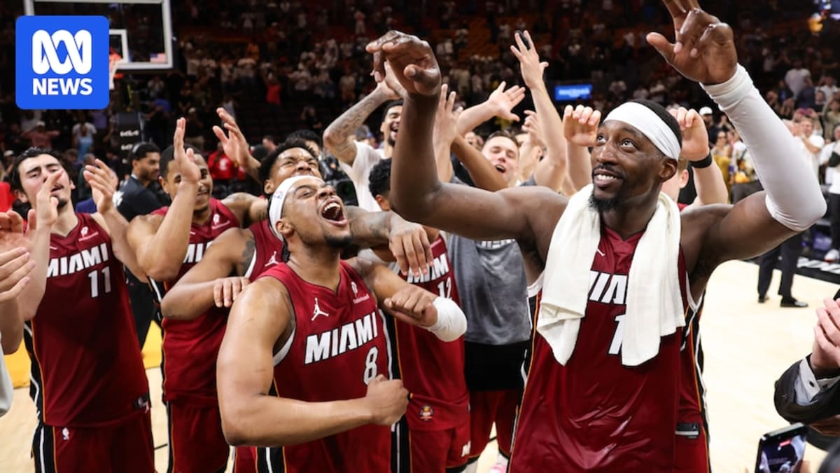 Bam Adebayo celebrating on basketball court after scoring 83 points for Miami Heat