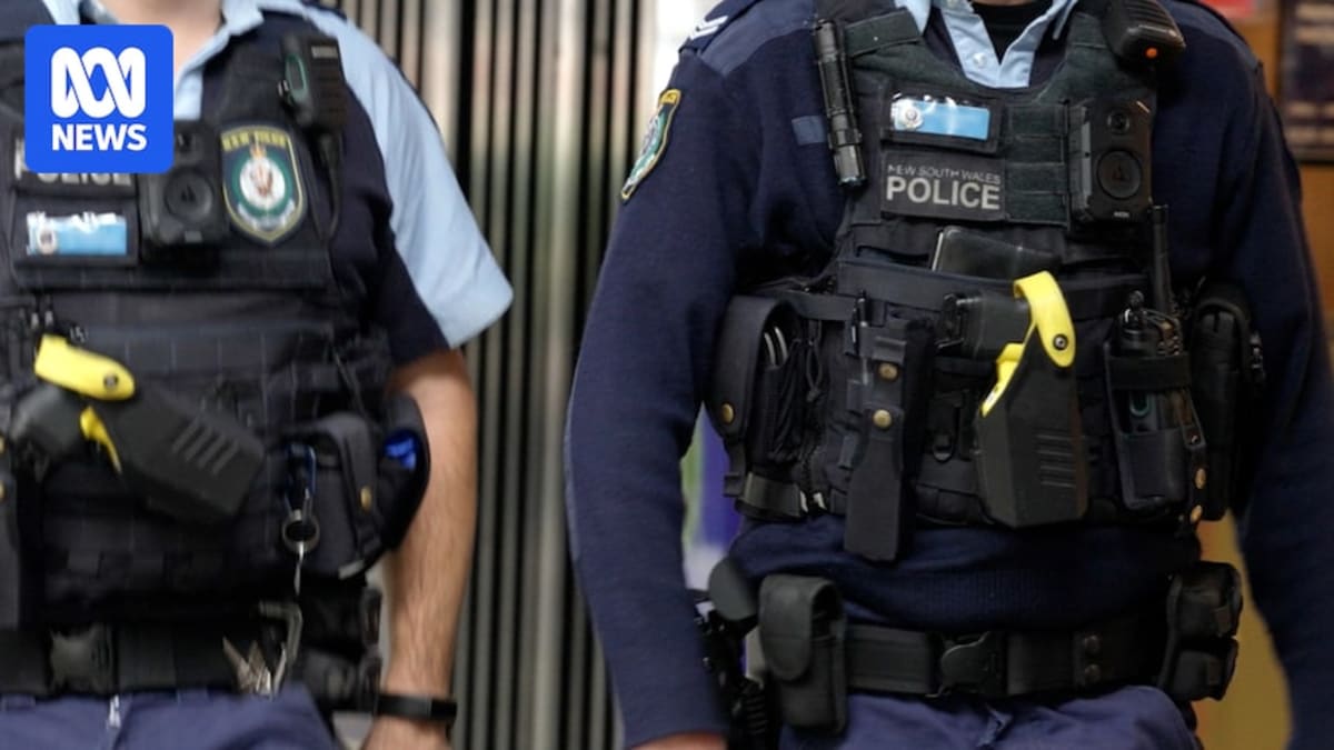 NSW Police officer wearing body-worn camera on uniform while on duty