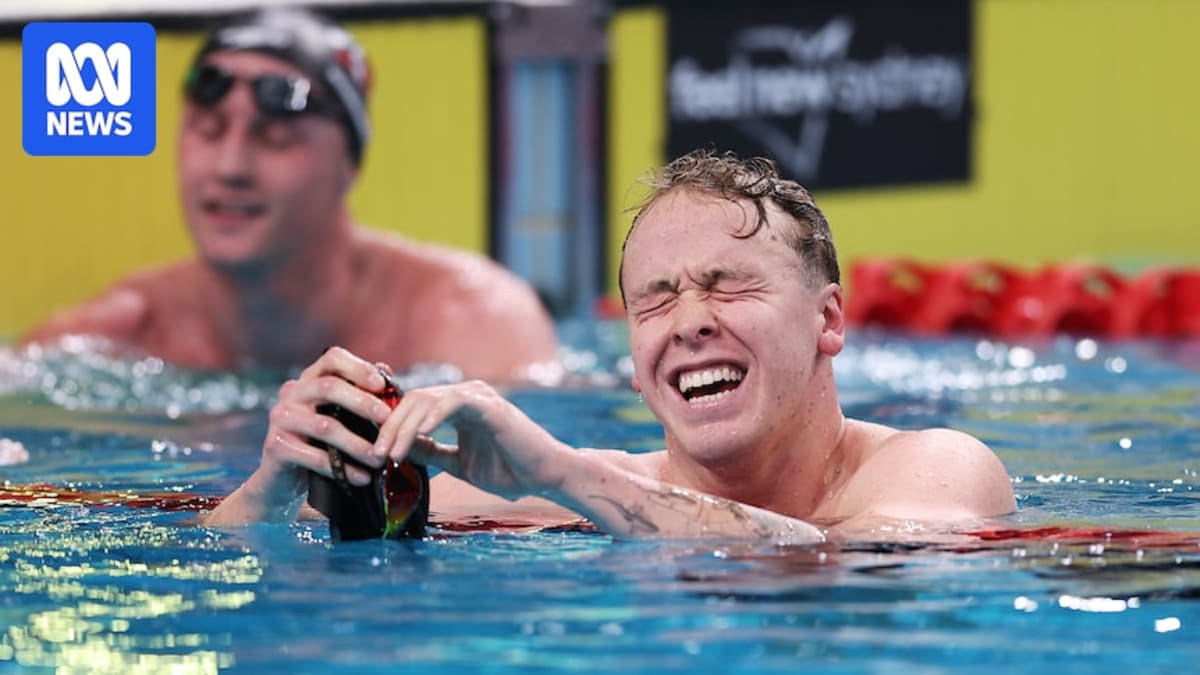 Sam Short celebrating in pool after swimming personal best 400 meter freestyle time at Australian trials