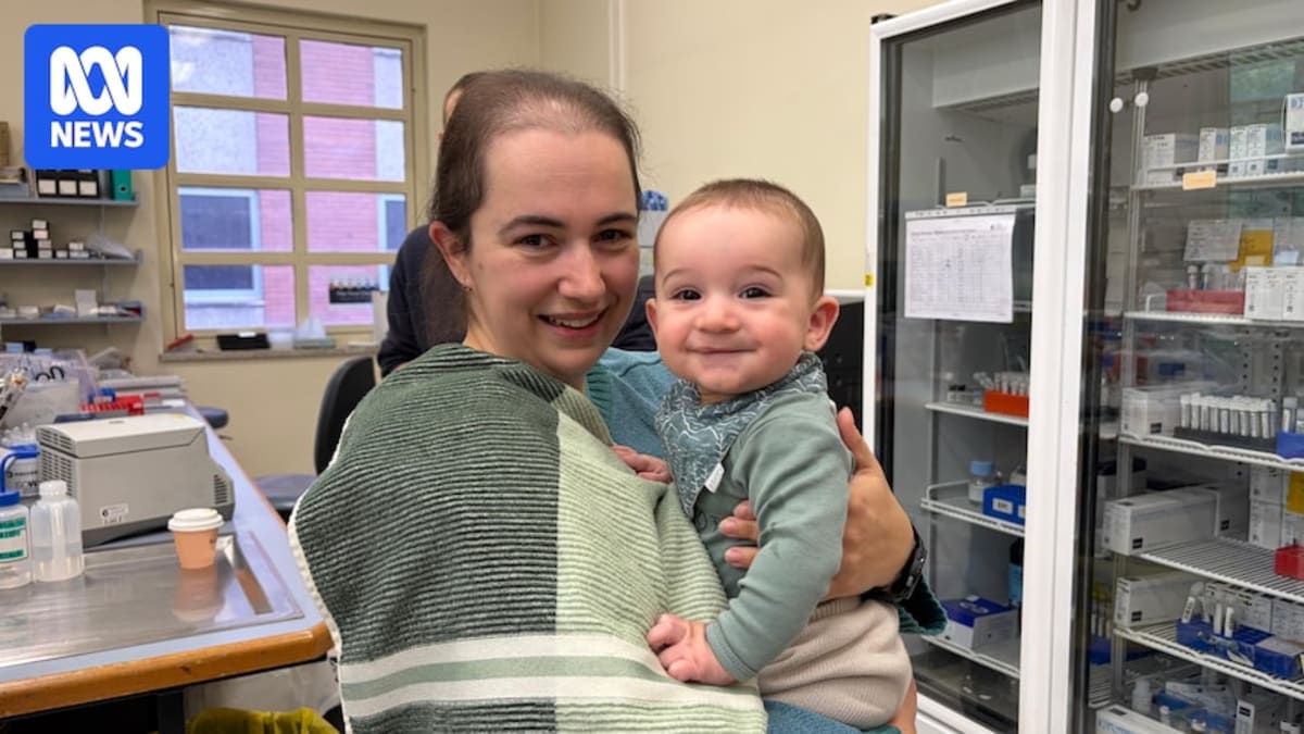 Bonnie Haselgrove holding six-month-old baby Evan who was born after omega-3 trial participation