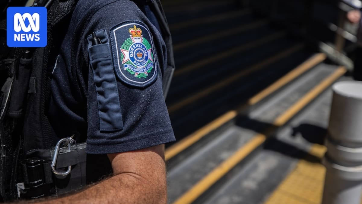 Queensland police patrol car on street, representing improved public safety statistics across the state