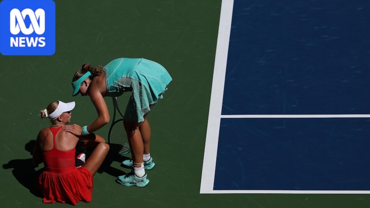 Tennis players Mirra Andreeva and Anastasia Potapova embrace at net after US Open match