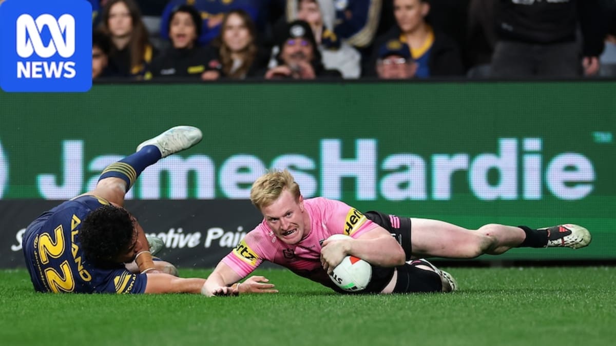 Tom Jenkins celebrates after scoring record-breaking try for Penrith Panthers during comeback victory