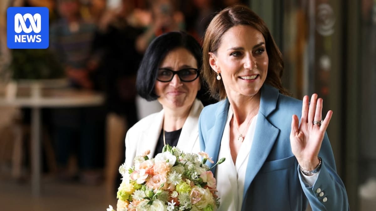 Princess Kate in light blue suit greeting young children outside Italian town hall