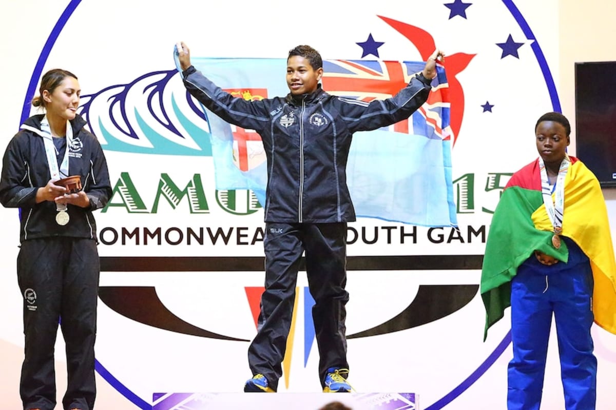 Weightlifter Wins Third Gold After Olympic Heartbreak - Image 5