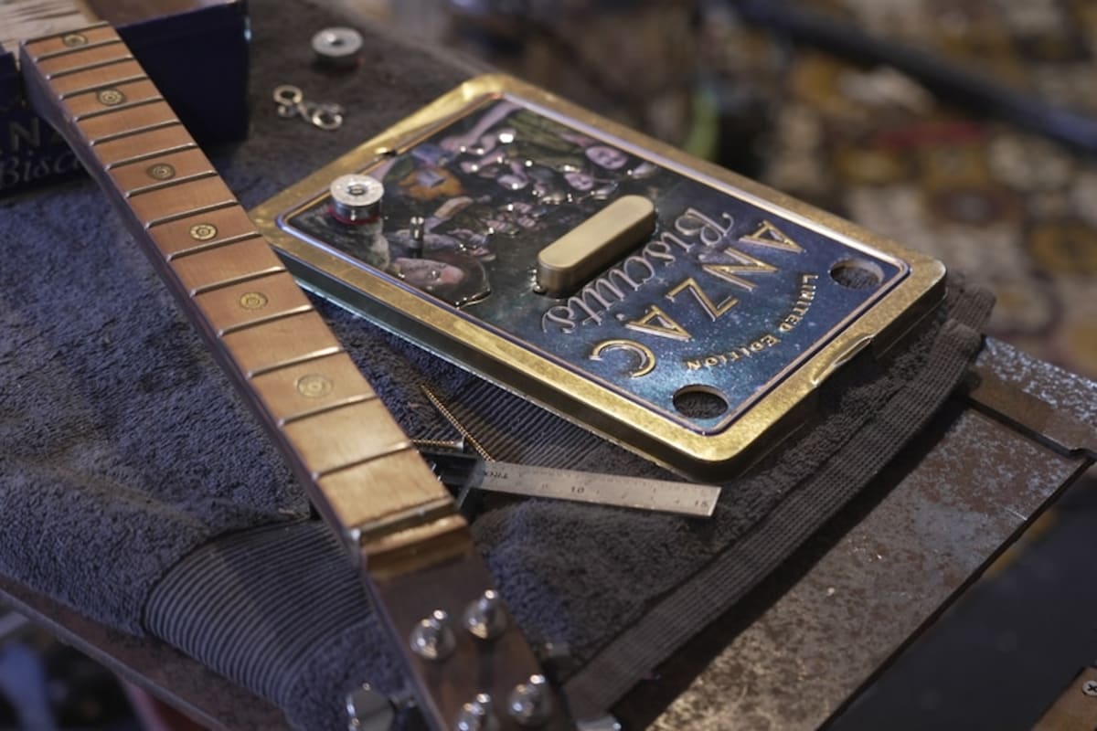 Tasmanian Musician Crafts Guitars from Biscuit Tins for Vets - Image 5