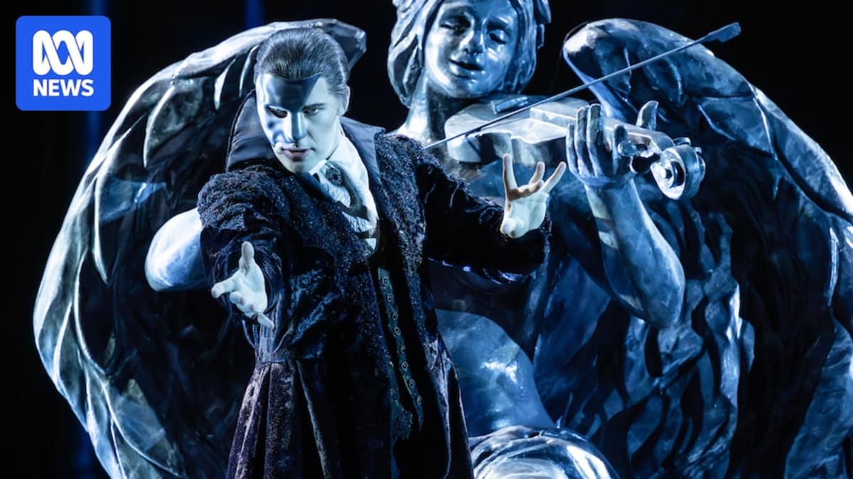 Young man in phantom costume rehearsing for Opera Australia production on Sydney Harbour