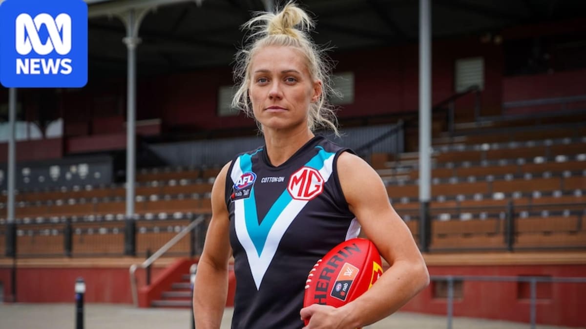 Erin Phillips in Adelaide Crows uniform celebrating historic Hall of Fame induction