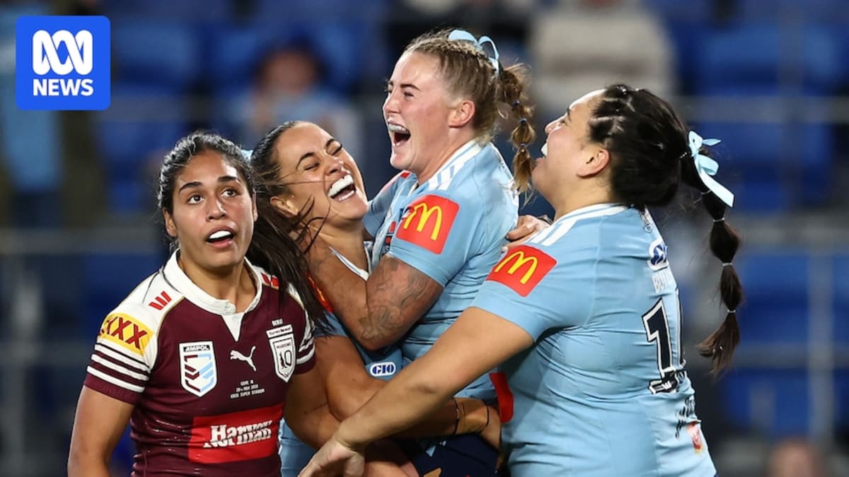 ** NSW Blues women's rugby team celebrating historic State of Origin clean sweep victory