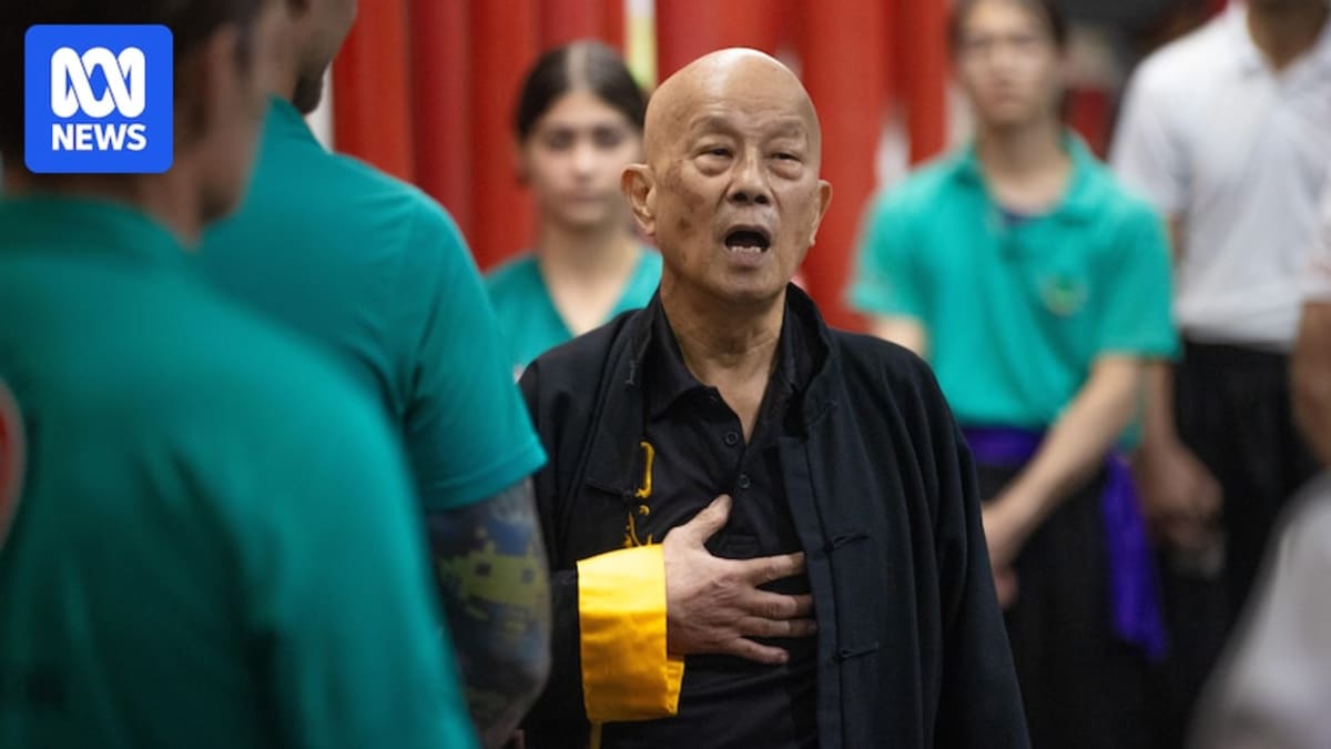 Henry Sue, 83, demonstrates kung fu stance at his Brisbane academy where he teaches students
