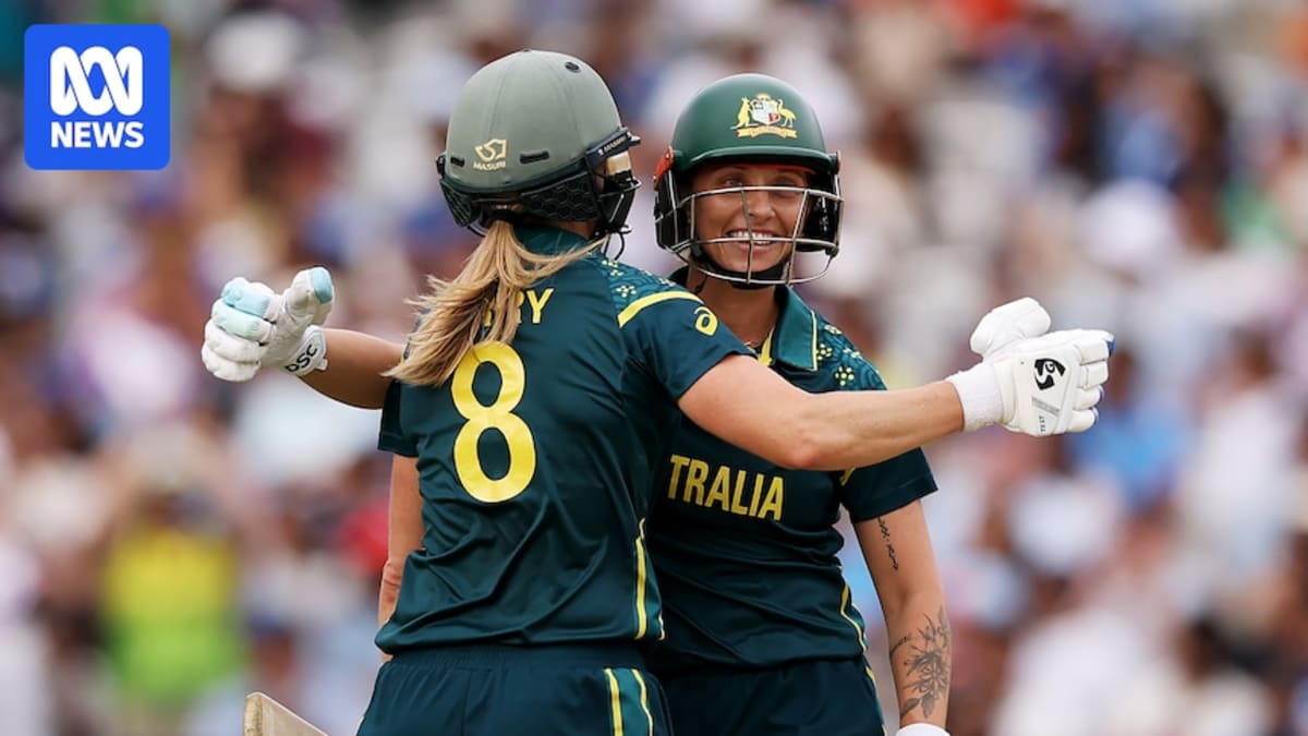 Ellyse Perry and Ash Gardner celebrate batting partnership during T20 World Cup match at Lord's