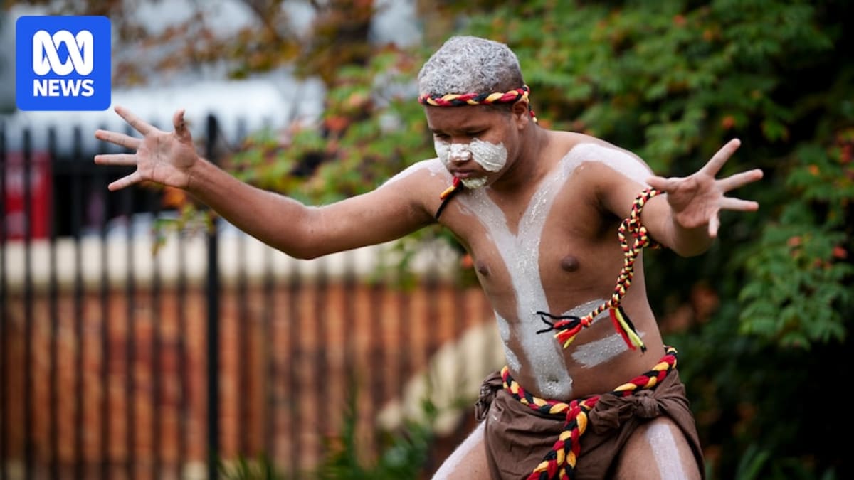Indigenous elder performing Welcome to Country ceremony with smoking ritual during Reconciliation Week in Perth