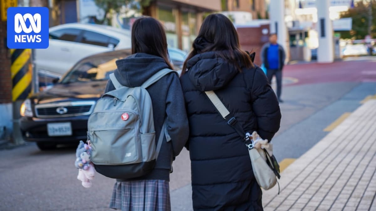 Malaysian students walking together in school hallway representing safer educational environment under new anti-bullying protections