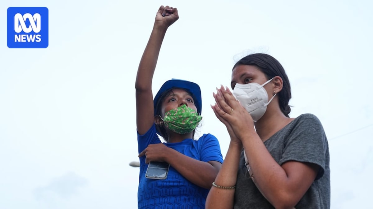 Rescuers carefully extract baby Juan David and mother Dayana from earthquake rubble in Venezuela