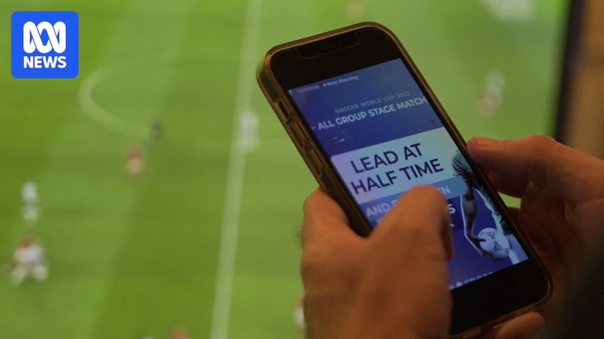 Australian children watching sports game in stadium without gambling advertisements visible