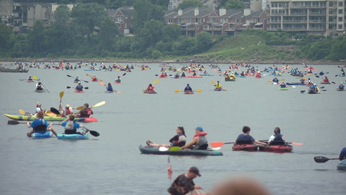 Hundreds of kayakers and paddleboarders gathered on Cincinnati river for Paddlefest anniversary celebration