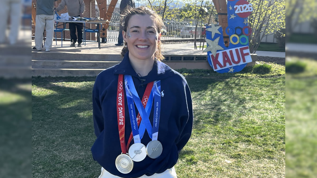 Olympic moguls skier Jaelin Kauf smiling with three silver medals in Driggs, Idaho
