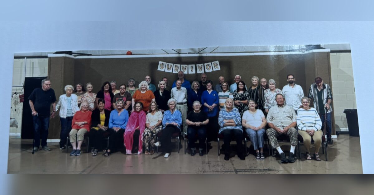 Cancer survivors gathering together at community dinner celebration event in Tennessee