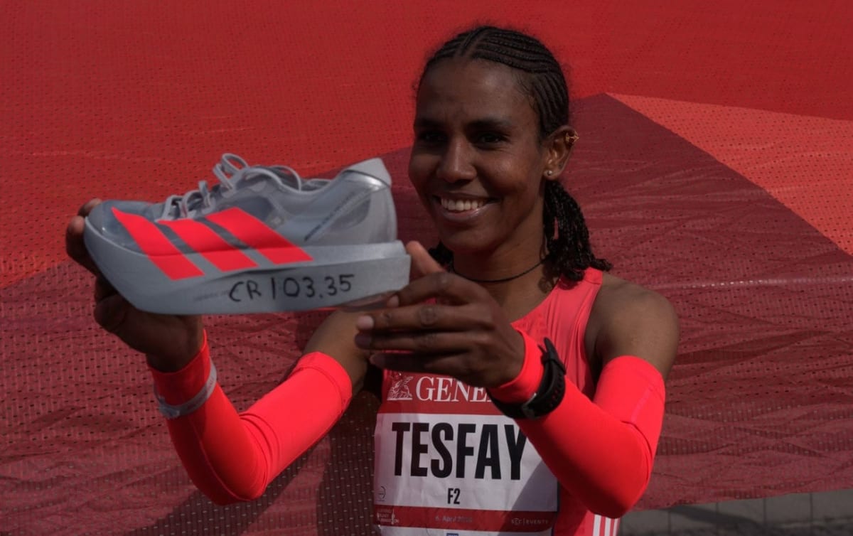Ethiopian marathon runner Fotyen Tesfay competing in a race wearing athletic gear