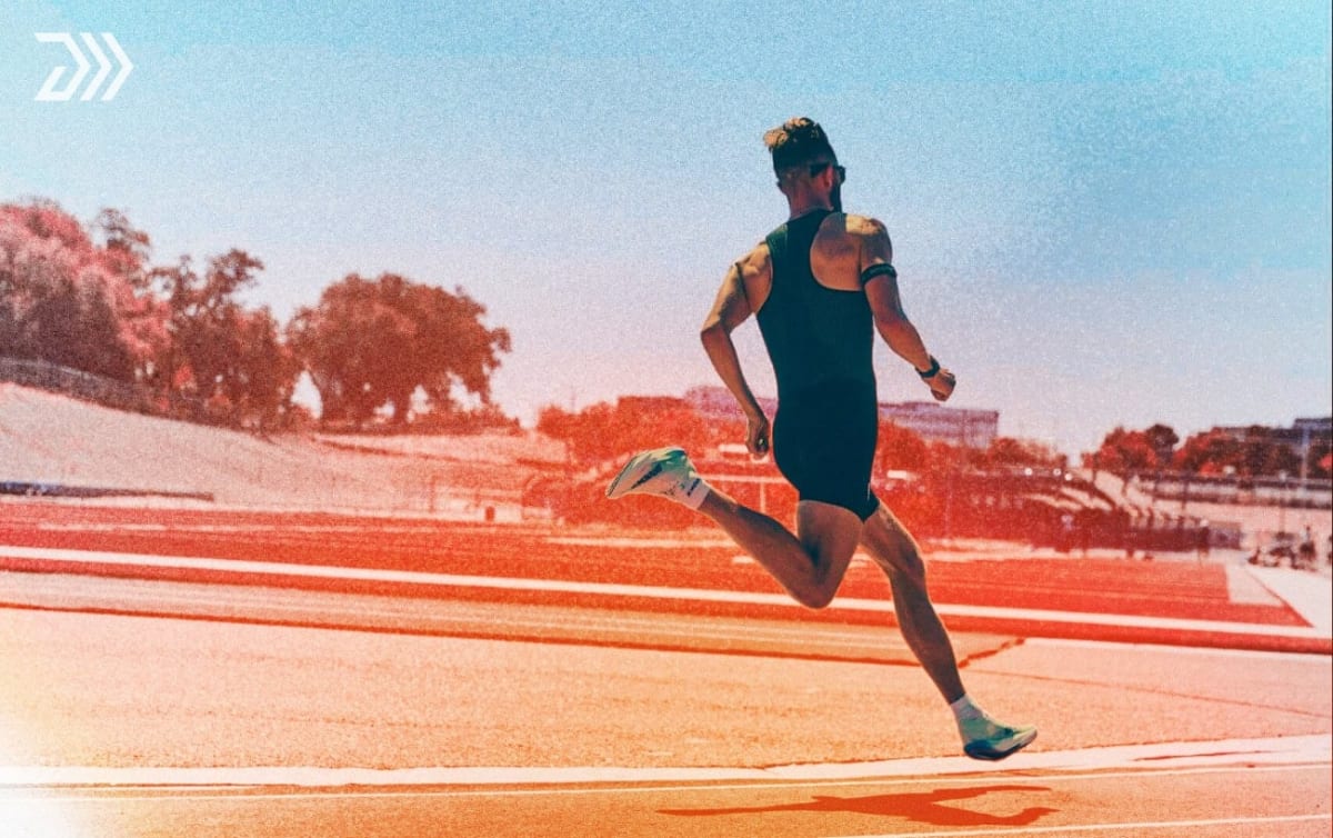 Josh Kerr crossing finish line at London Stadium during world record mile run