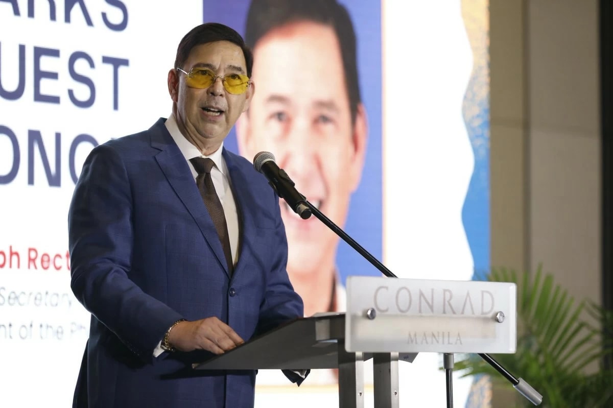Filipino families celebrating economic progress and poverty reduction in the Philippines