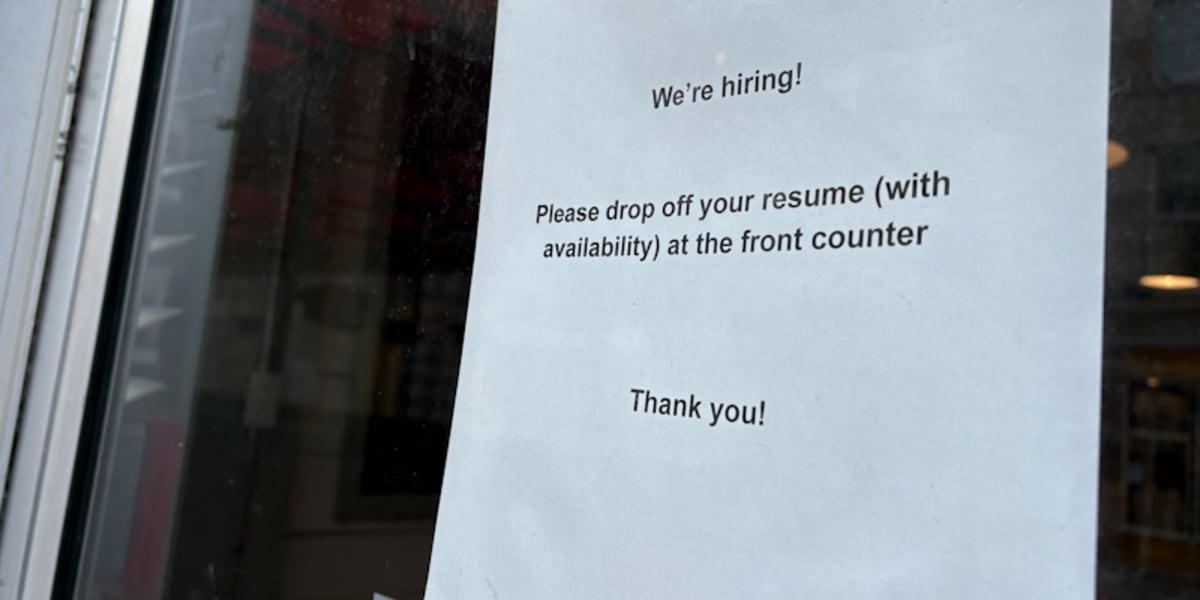 Workers celebrating new job opportunities as Canada's employment market rebounds with strong May gains