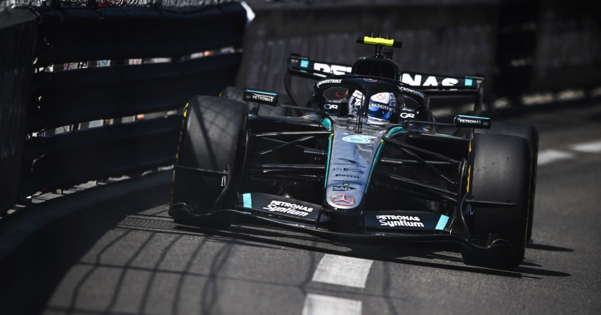 Young race car driver Kimi Antonelli celebrating his Monaco Grand Prix victory on podium
