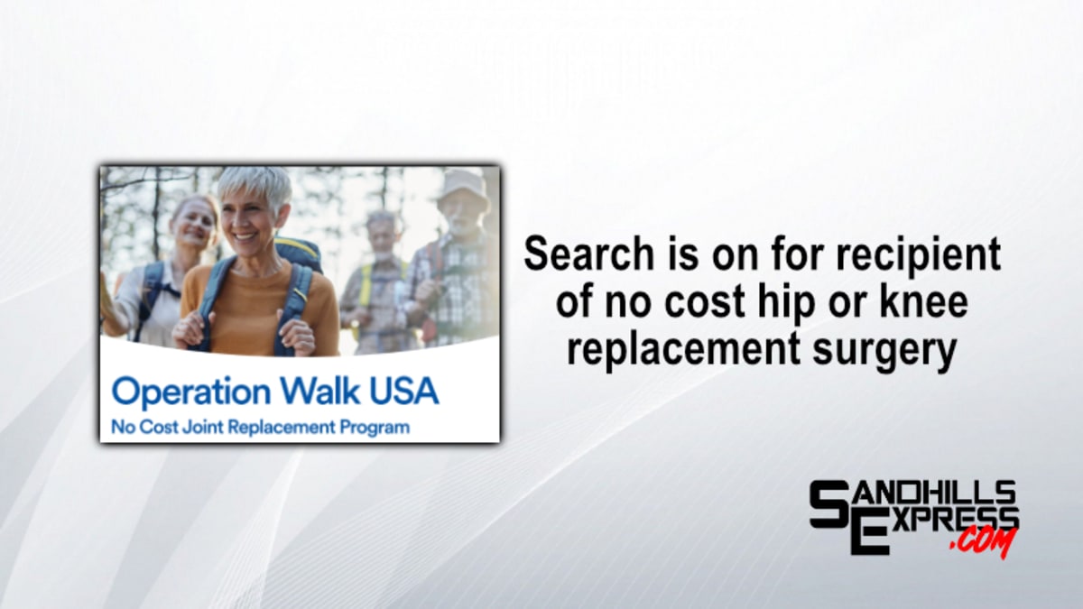 Orthopedic surgeon consulting with patient about knee replacement surgery in medical office
