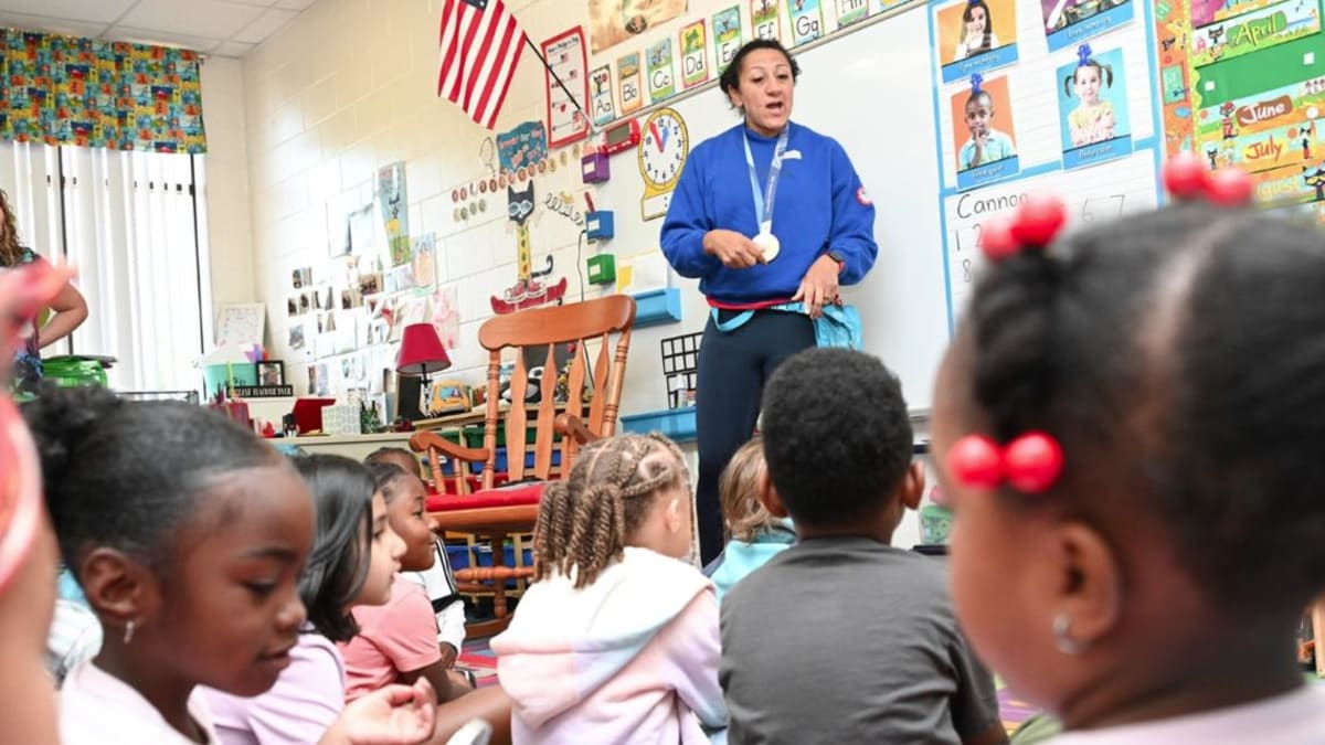 Olympic Gold Medalist Visits Georgia Pre-K with Medals