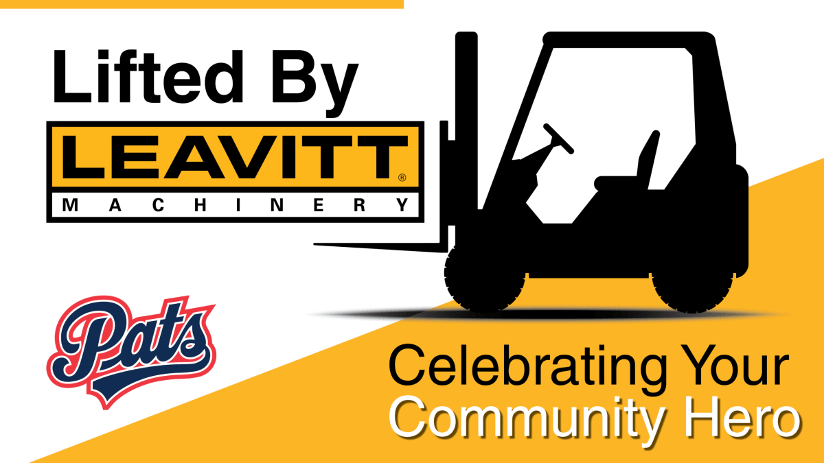 Regina Pats hockey players on ice celebrating community partnership with local business