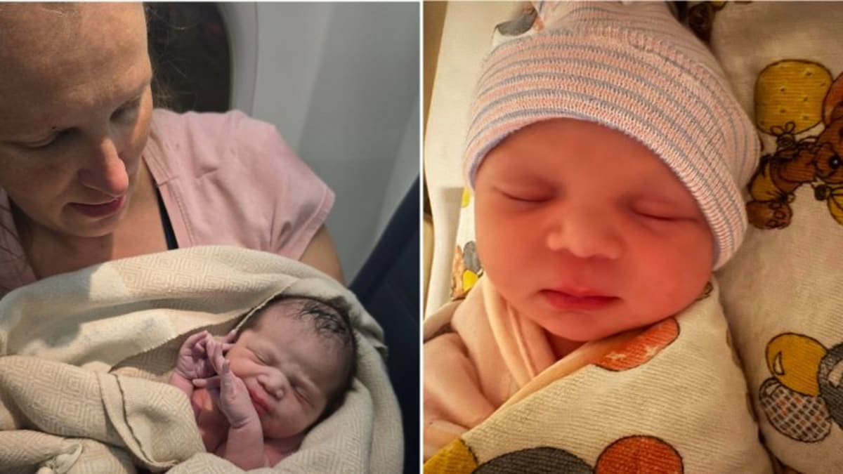 New mother Ashley Blair holds newborn baby Brielle wrapped in blankets on airplane