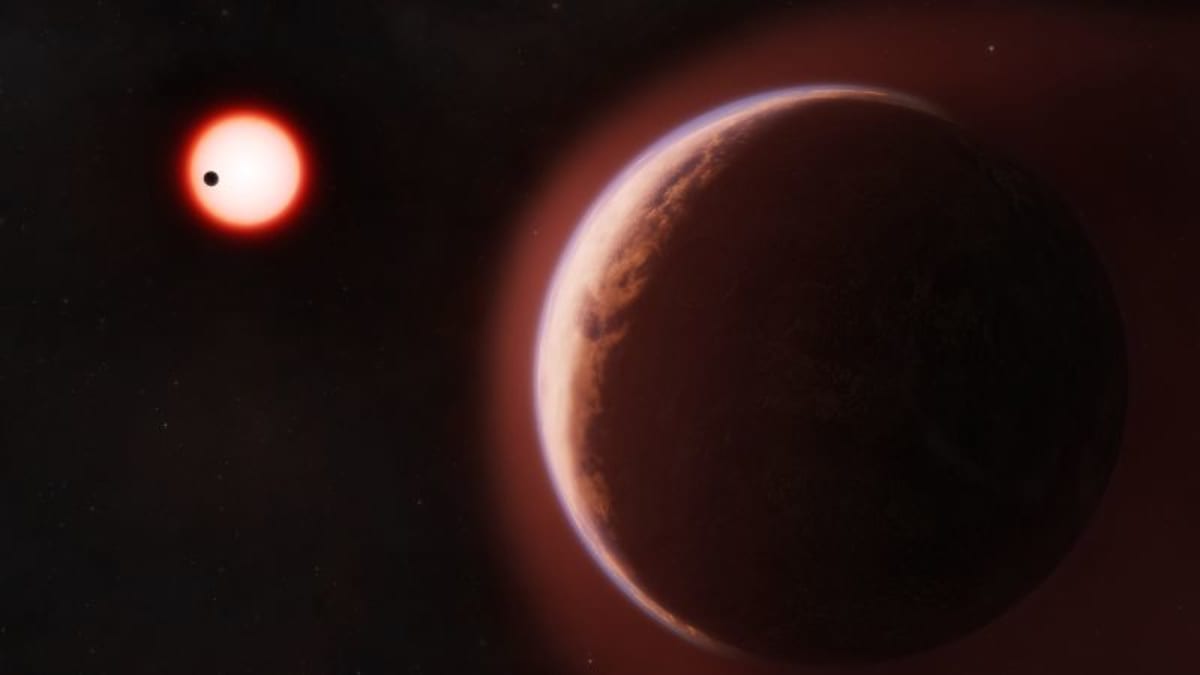 Artist's rendering of rocky exoplanet LHS 1140b orbiting red dwarf star with visible atmosphere