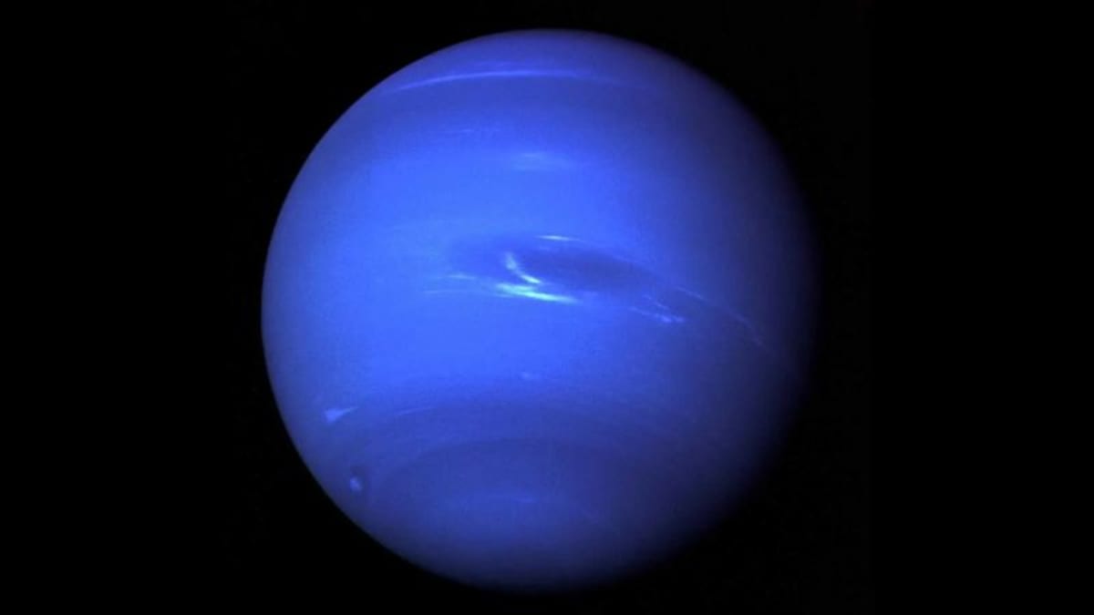 Neptune's moon Nereid photographed by Voyager 2 spacecraft in 1989 showing pixelated distant view