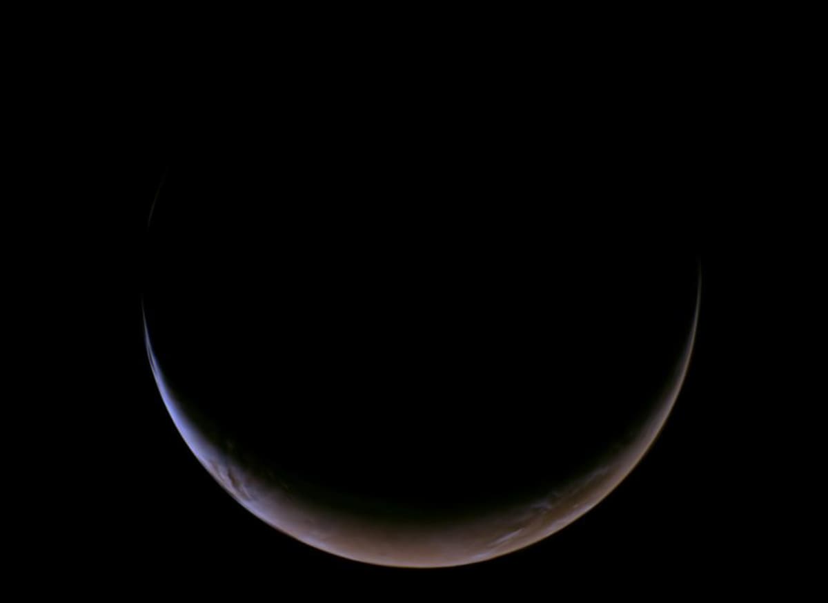 NASA Spacecraft Snaps Rare Crescent View of Mars - Image 3