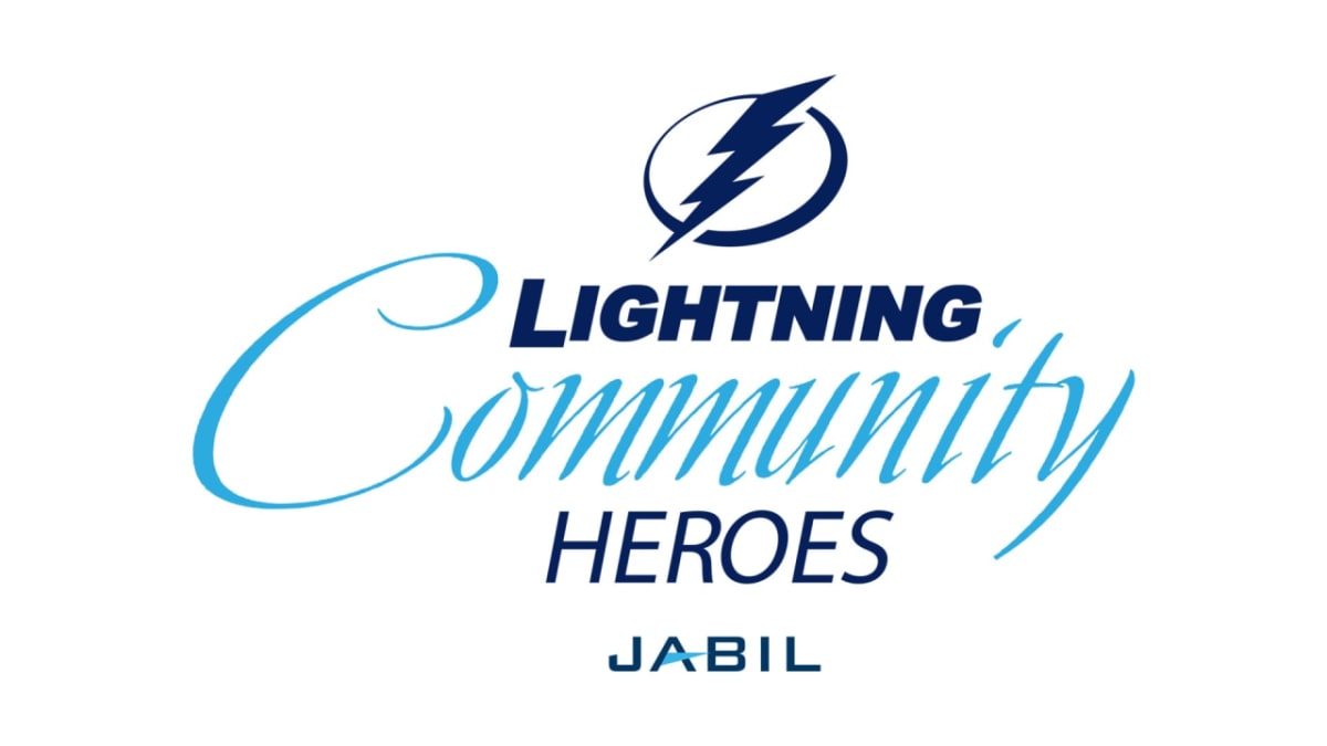 Tampa Bay Lightning Community Heroes receive oversized ceremonial checks at hockey arena ceremony