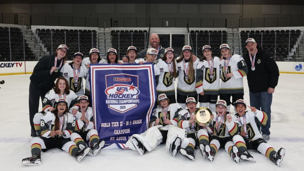 Vegas Jr. Golden Knights girls hockey team celebrating their national championship victory on ice