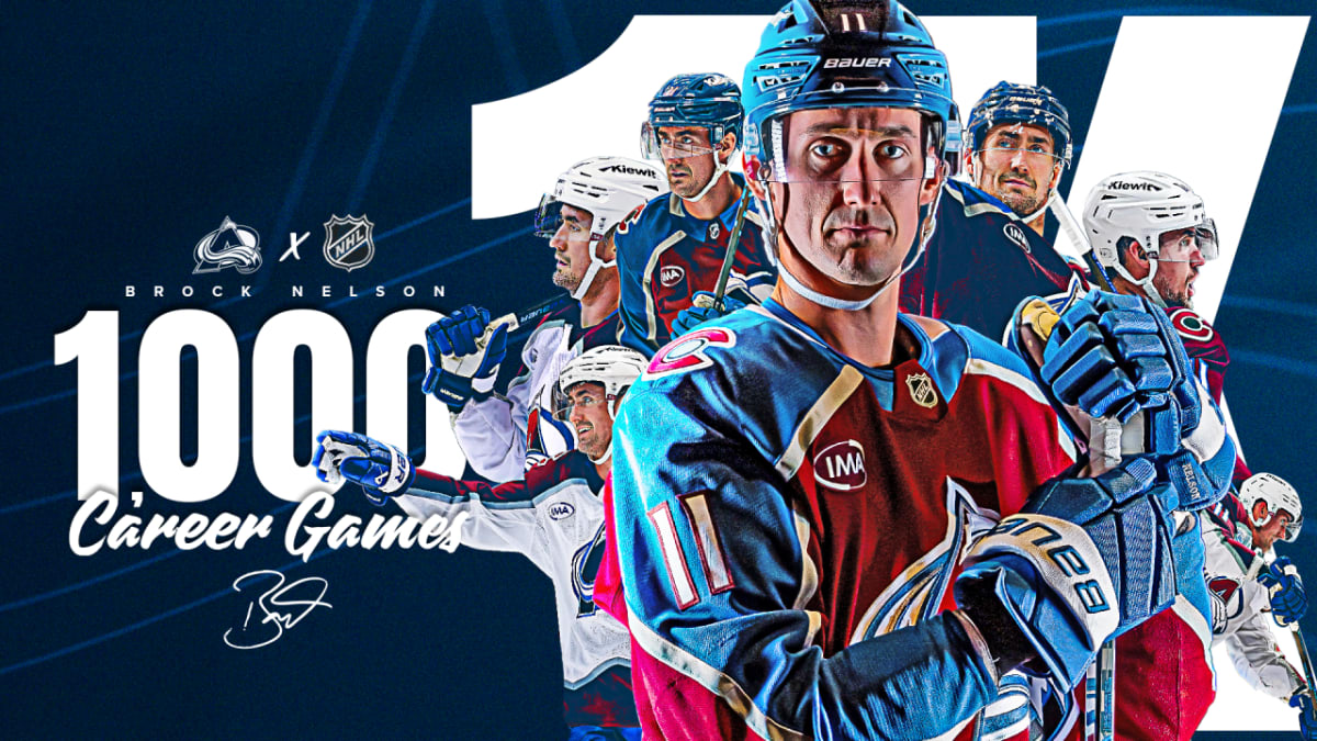 Brock Nelson in Colorado Avalanche jersey celebrating on ice during NHL game