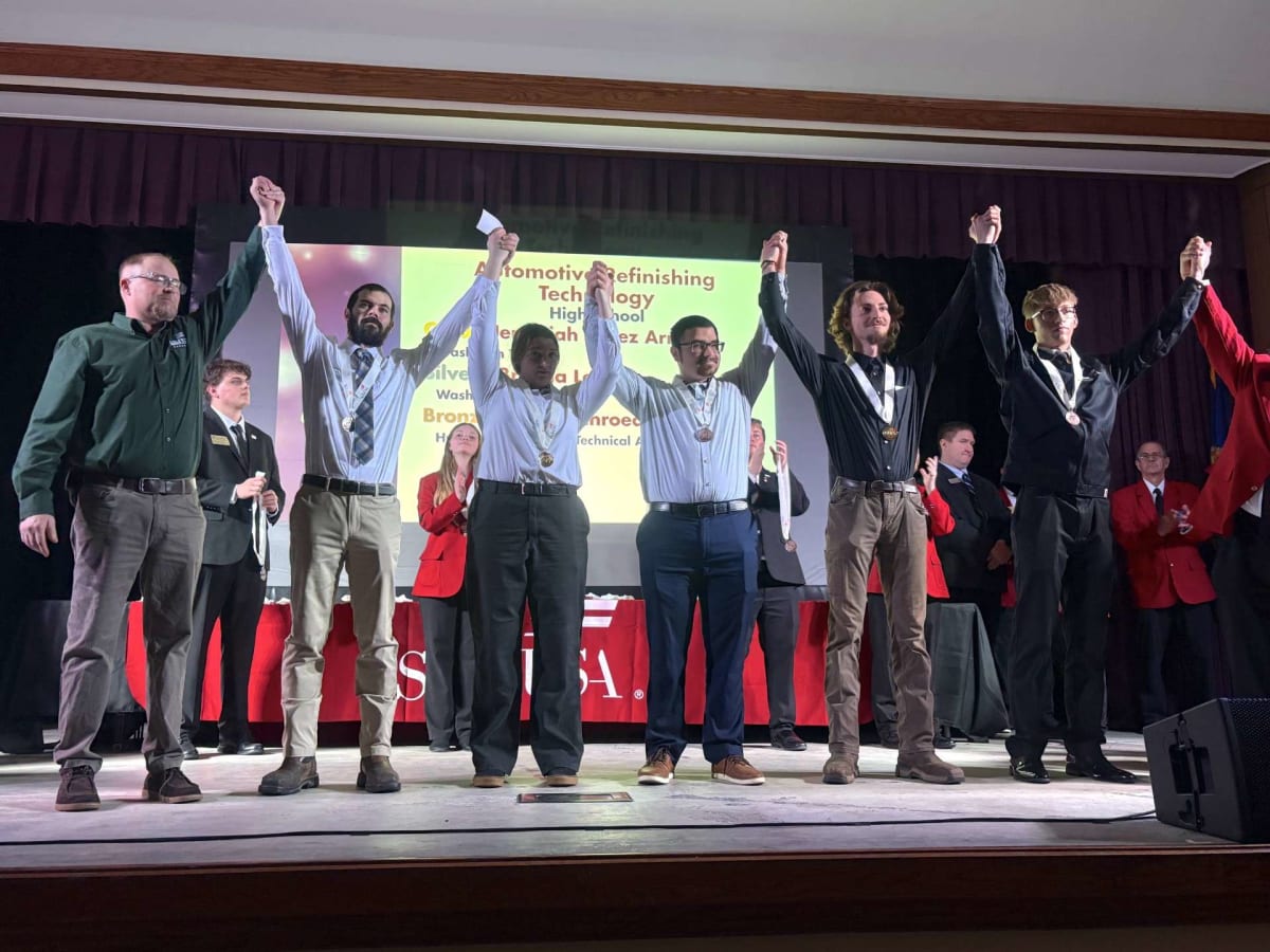 Marissa Reever and Laike Imm pose with medals at SkillsUSA Kansas competition