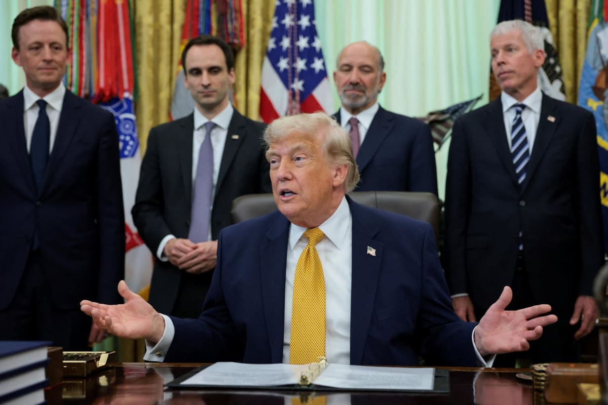 President Trump signing executive order on quantum computing in the Oval Office